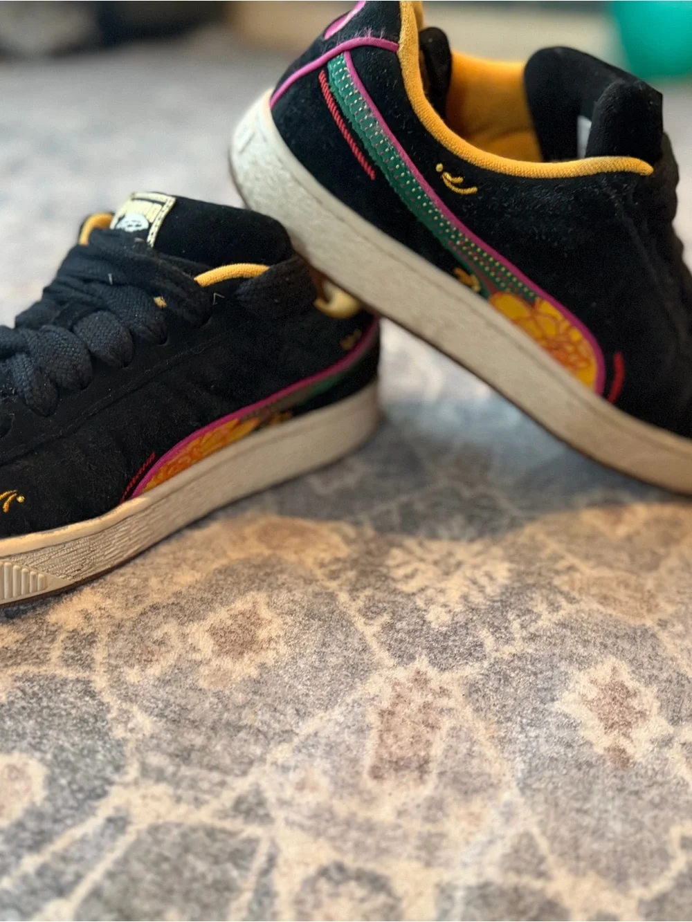 Puma Black Suede Sneakers with Yellow Lining and Pink & Green Accents